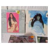 Cher and Bonnie Raitt Vinyl Records including Greatest Hits, Sweet Forgiveness, and Half-Breed Albums