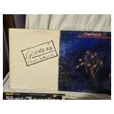 Lot of Vinyl Records Featuring Genesis, Bob Seger, and More