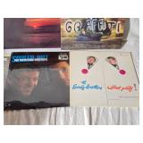 Lot of Vinyl Records Featuring Genesis, Bob Seger, and More