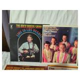 Vinyl Records Including Buck Owens, Dean Martin, and Louis Armstrong