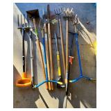 G - Collection of 9 Yard and Garden Tools Including Shovel, Post Hole Digger, Tampers, and Rakes
