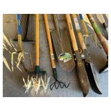 G - Collection of 9 Yard and Garden Tools Including Shovel, Post Hole Digger, Tampers, and Rakes