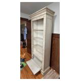 BS - Tall Cream Wood Bookcase with Ornate Carved Details and Drop-Down Door