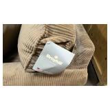 Upholsters Sleeper Couch with tags still on it