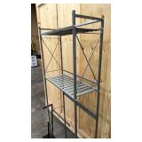 Over the toilet metal shelf and toilet paper holder