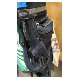 three right handed sets of clubs and bags = R5 driver, and misc clubs