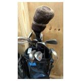 three right handed sets of golf clubs