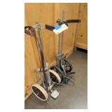 two vintage push carts