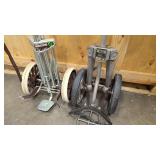 two vintage push carts