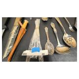 Misc knifes, silverware, and measuring spoons