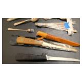 Misc knifes, silverware, and measuring spoons