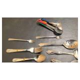 Misc knifes, silverware, and measuring spoons