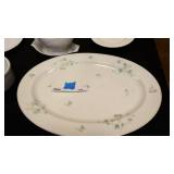 Large ceramic platter, gravy boat with plate, ceramic dish with cover, 3 misc plates