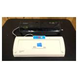 Two Vacuum Sealers