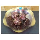 Large decorative glass bowl and 3 wood painted balls