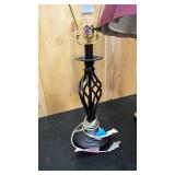 Miss matched table lamps = one black and modern, and the other vintage brass