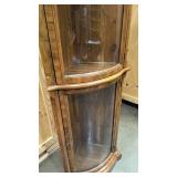 Antique curved glass curio cabinet
