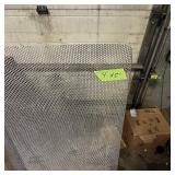 Sheets of metal apear to be Aluminum