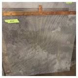 Sheets of metal apear to be Aluminum