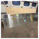 Sheets of metal apear to be Aluminum