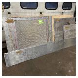 Sheets of metal apear to be Aluminum