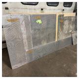 Sheets of metal apear to be Aluminum