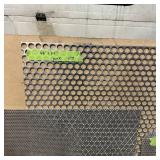 Sheets of metal apear to be Aluminum