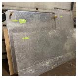 Sheets of metal apear to be Aluminum