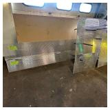 Sheets of metal apear to be Aluminum