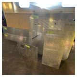 Sheets of metal apear to be Aluminum