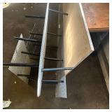 Sheets of metal apear to be Aluminum