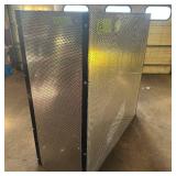 Sheets of metal apear to be Aluminum