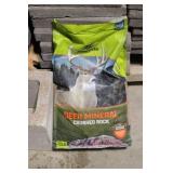 Pallet Lot of Concrete Pavers, Cinder Blocks, and Deer Mineral Bag