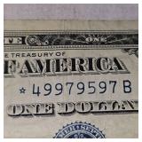 (2) 1957 "Star Note" Silver $1 Certificates