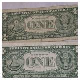(2) 1957 "Star Note" Silver $1 Certificates