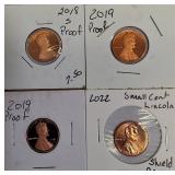 2018-S Lincoln Cent Proof, two 2019-S Lincoln Cent Proofs, and 2022-S Shield Reverse Lincoln Cent Proof.
