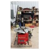 Mayflower Red Tire Changer with a bead blaster.