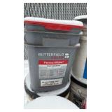 Pallet of buckets of color hardener for concrete