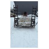 2002 PJ Flatbed equipment trailer with two loa with two loading ramps.