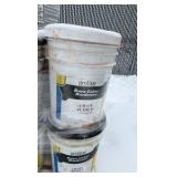 Pallet of buckets of color hardener for concrete