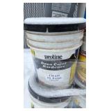 Pallet of buckets of color hardener for concrete