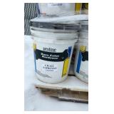 Pallet of buckets of color hardener for concrete