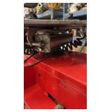 Mayflower Red Tire Changer with a bead blaster.