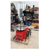 Mayflower Red Tire Changer with a bead blaster.