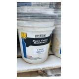 Pallet of buckets of color hardener for concrete