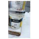 Pallet of buckets of color hardener for concrete