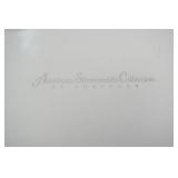 American Silversmiths Collection by Godinger USA. Silver-plated Berry Serving Spoons with a gold wash.