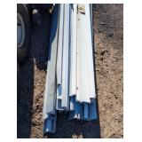 Assorted pile of mixed aluminum J&F Channel siding trim 10 ft long some small mixed parts - White