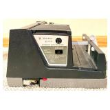 Ward 644 Automatic Slide Projector - Coated Anastigmat 4-Inch Lens and Radiant Deluxe Meteor Tripod Projection Screen