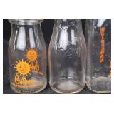 Glass Bottles - Golden Sun Logo & Bridgeman Branding & Embossed Script